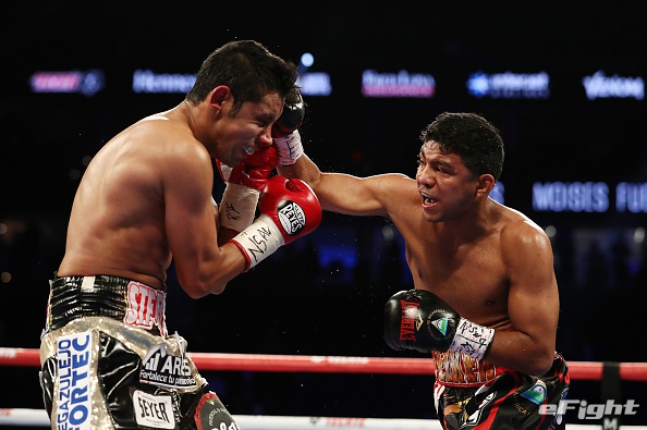LAS VEGAS, NV - SEPTEMBER 15: Roman Gonzalez punches Moises Fuentes during their super flyweight bout at T-Mobile Arena on September 15, 2018 in Las Vegas, Nevada. (Photo by Al Bello/Getty Images)